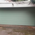 Mint green sectional garage door
