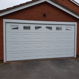 white cardale insulated electric sectional garage door