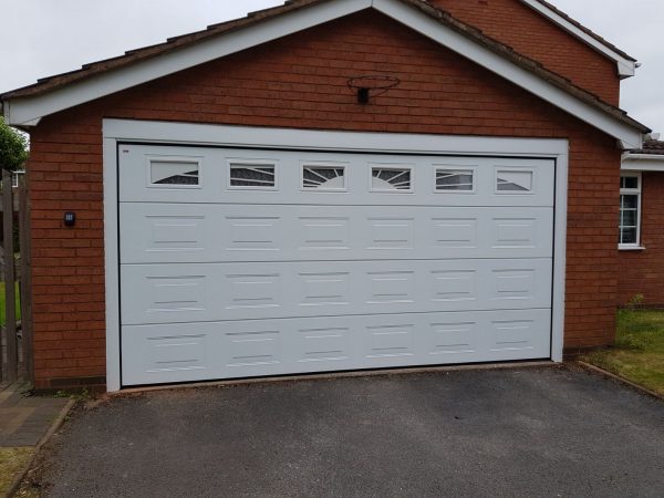 white cardale insulated electric sectional garage door