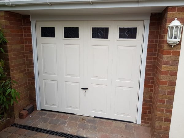ivory up and over canopy style garage door