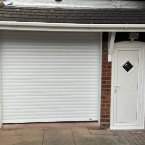 Matching white front door and garage door