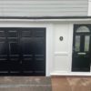 House with matching black front door and garage door