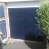 dark blue up and over garage door