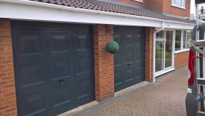 Double garage with two grey cardale up and over garage doors