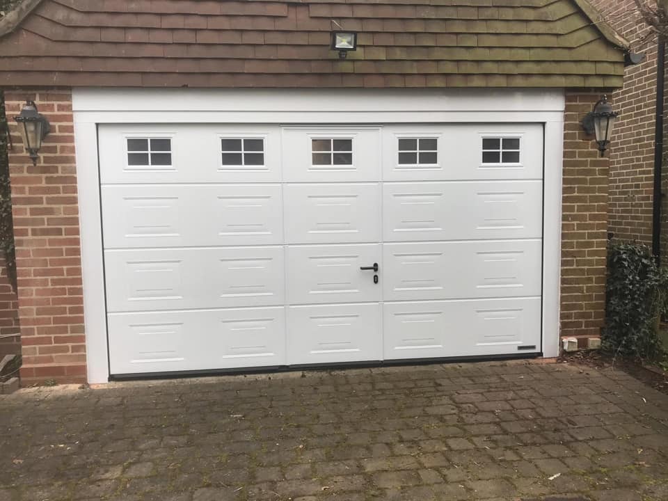 White pedestrian garage door