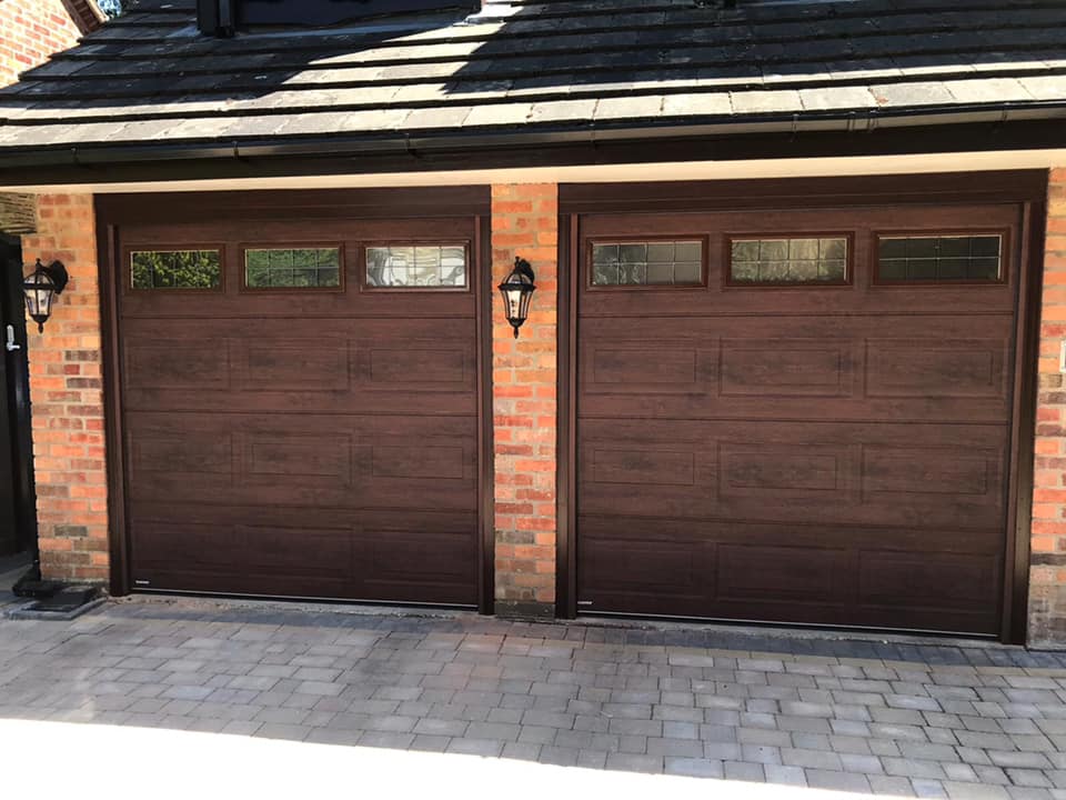 Teckentrup garage doors in rosewood with windows