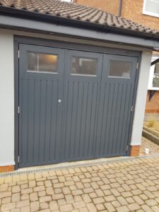 Bi-fold garage door