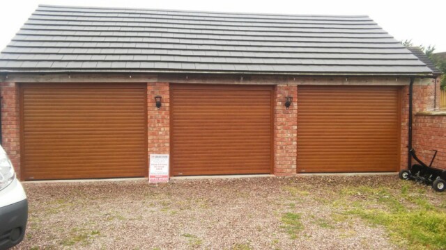 Oak Automatic SWS Triple Garage Doors triple, wooden roller garage doors