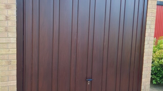 Rosewood Cardale Up and Over Canopy Door Dark wood canopy garage door