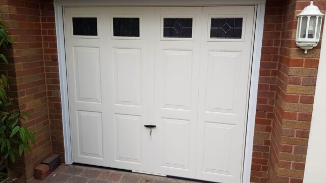Light Ivory Up and Over Canopy Garage Door with Leaded Windows ivory up and over canopy style garage door