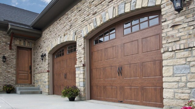 two wooden side hinged garage doors