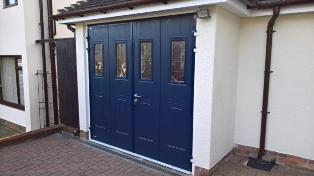 UPVC blue teckentrup side hinged garage door installation