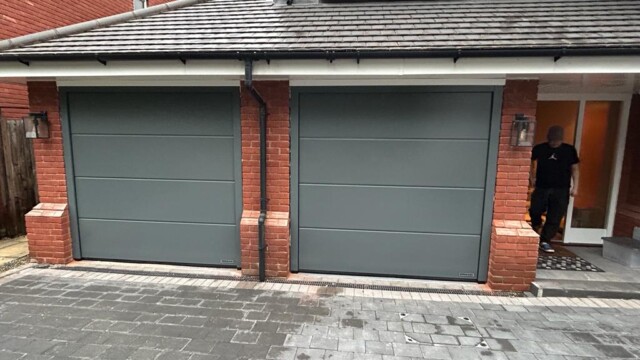 Grey Hormann Sectional Twin Garage Doors Hormann sectional garage doors