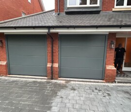 Grey Hormann Sectional Twin Garage Doors Hormann sectional garage doors
