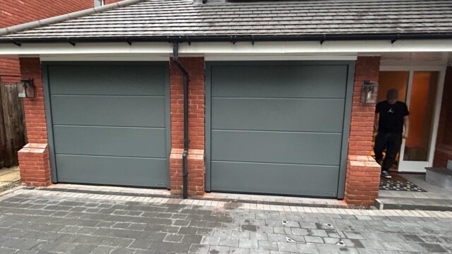 Grey Hormann Sectional Twin Garage Doors Hormann sectional garage doors