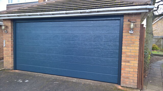 Grey Novoferm Double Electric Sectional Garage Door grey noverm automatic garage door