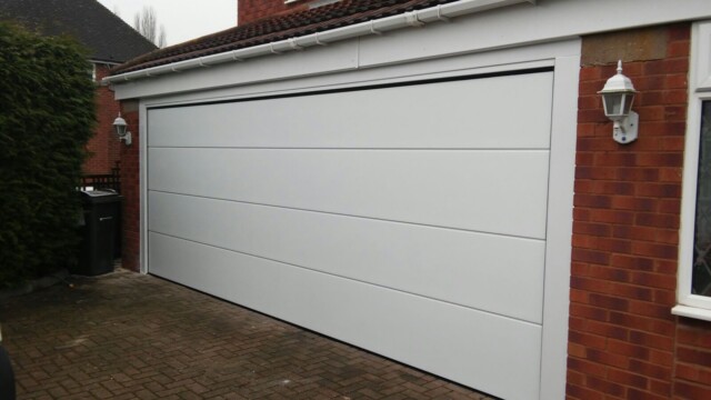 White Novoferm Electric Sectional Garage Door white electric garage door