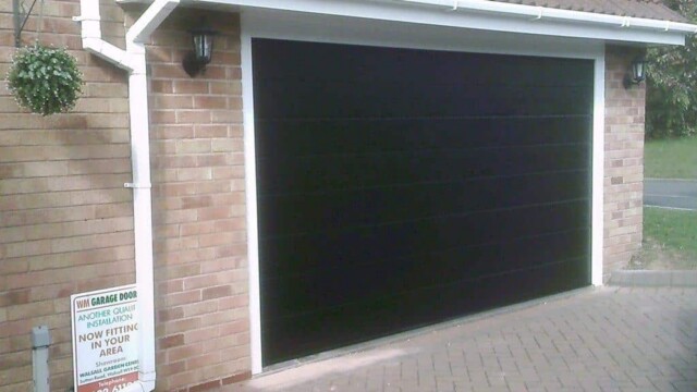 black sectional garage door installation
