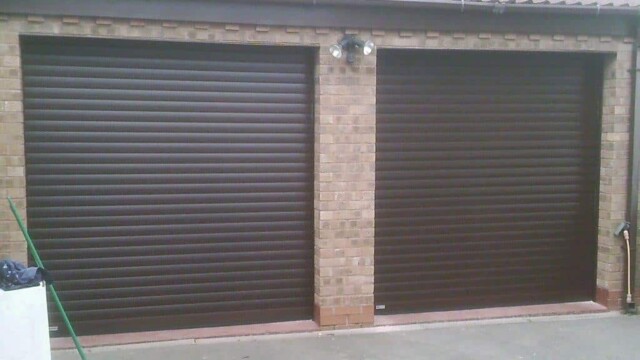 two dark brown roller garage doors
