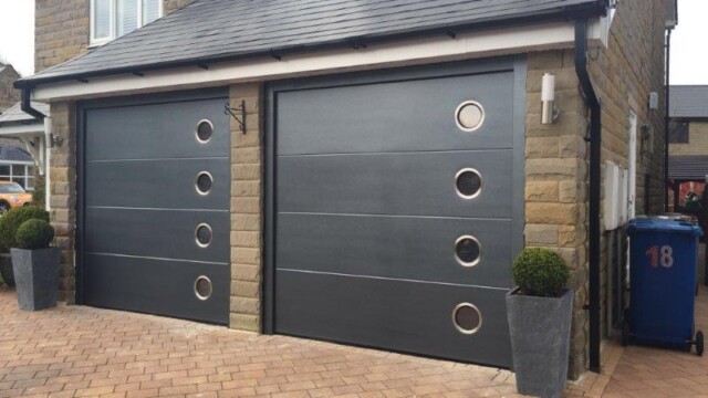 Black Sectional Twin Garage Doors with Windows two black sectional garage doors with windows