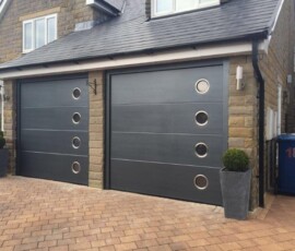 Black Sectional Twin Garage Doors with Windows two black sectional garage doors with windows