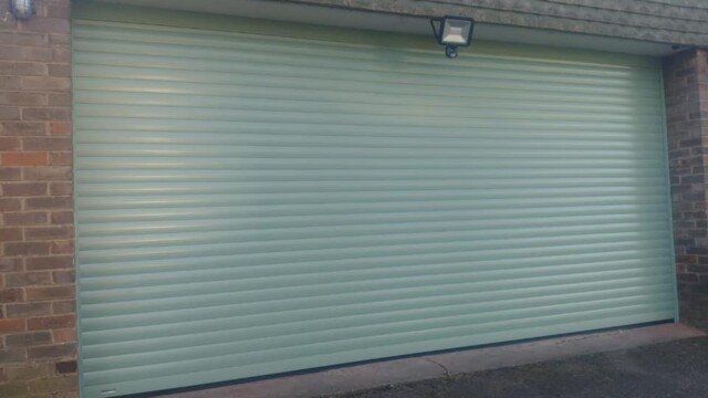 Green Roller Garage Door green roller garage door slightly open