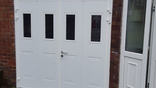 White side hinged insulated garage door