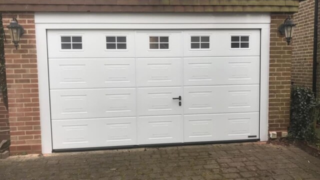 White pedestrian garage door