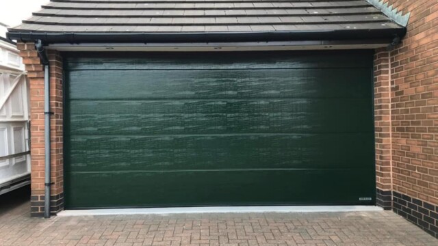 Hormann LPU42m garage door in green