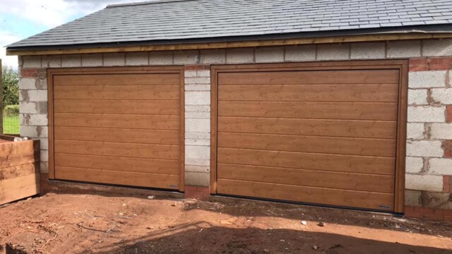 Brown Wood Effect Hormann Sectional Twin Garage Doors Hormannn sectional garage door