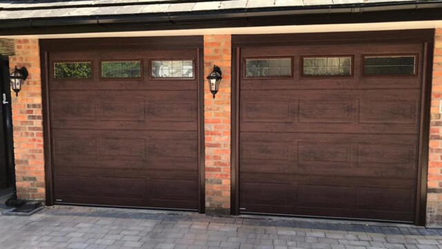 Rosewood Teckentrup Sectional Twin Garage Doors with Windows Teckentrup garage doors in rosewood with windows