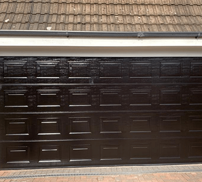 Extra wide black Garolla garage door