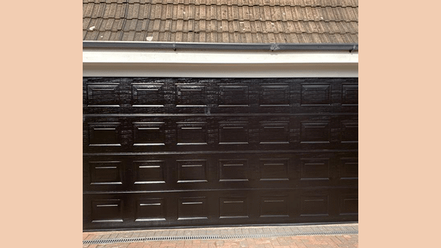 Extra wide black Garolla garage door