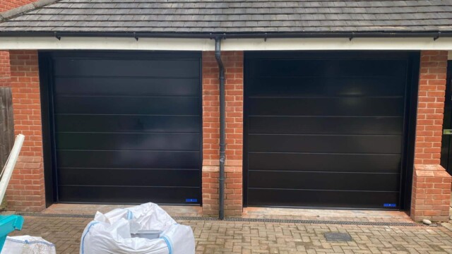 Two black garage doors