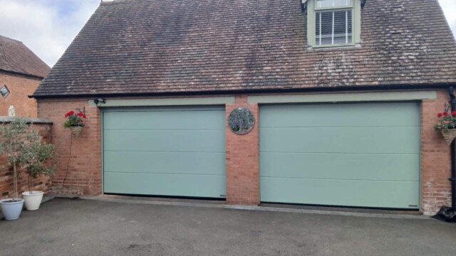 Green Hormann Sectional Twin Garage Doors